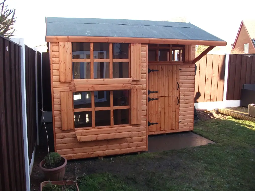 THIS IS A TWO STOREY PLAYSHED