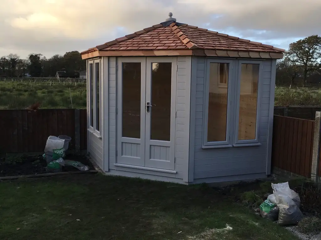 our vaulted roof corner summerhouses shown with stunning cedar shingle roof