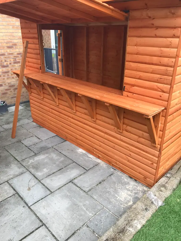 THIS IS A BAR IN A GARDEN