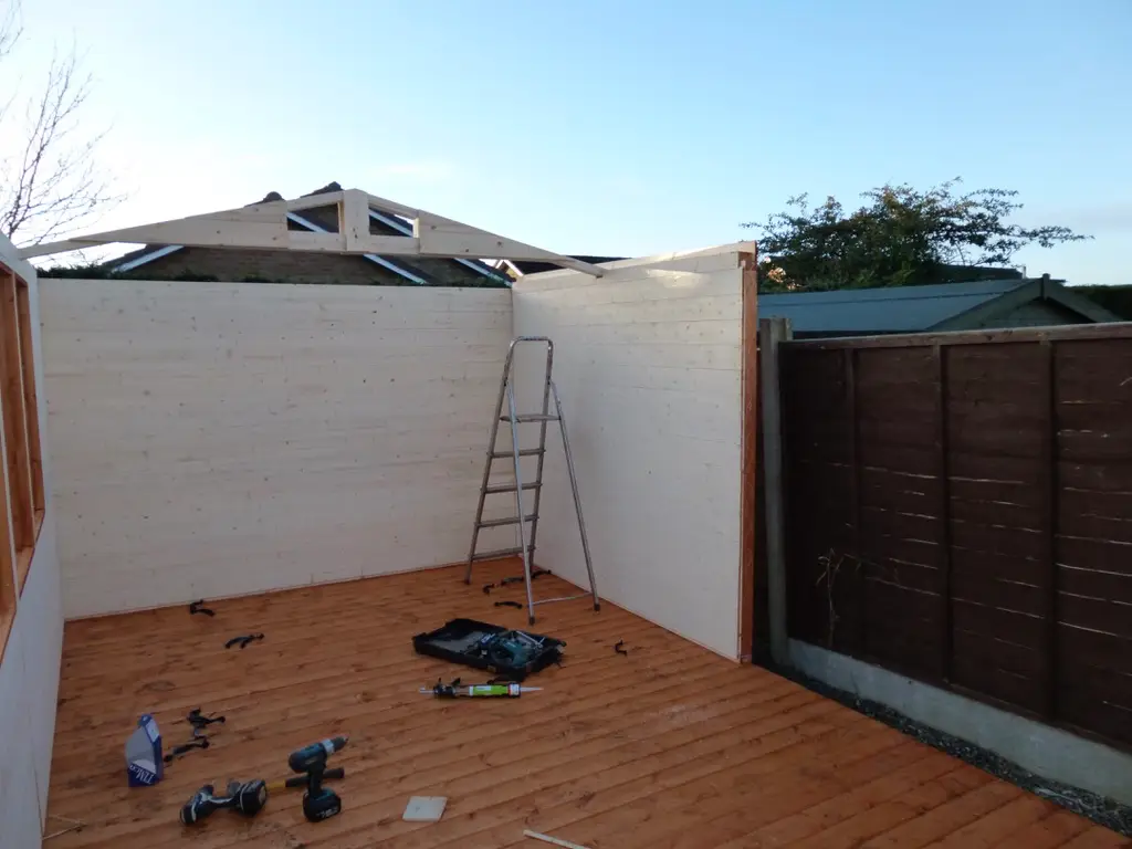 INSIDE PHOTO OF A WORKSHOP BEING ASSEMBLED