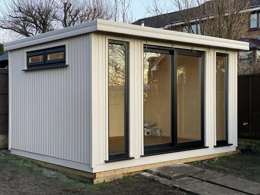 GARDEN ROOM AND STUDIO WITH UPVC BLACK DOORS AND WINDOWS