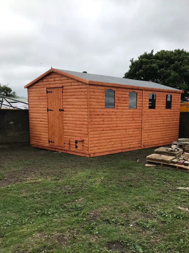 Lancashire Summerhouses- OUR RHINO LOG WORKSHOP ASSEMBLED IN A CUSTOMERS GARDEN